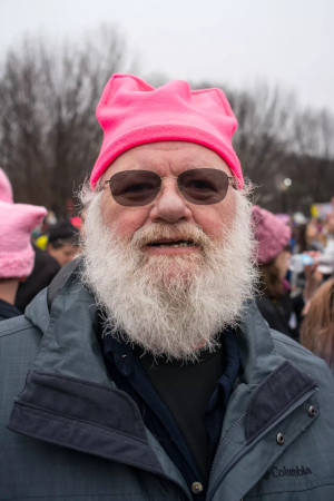 man in pink hat